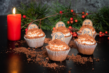 Cocoa Banana Halloween cupcakes with tombstone with red Candle
