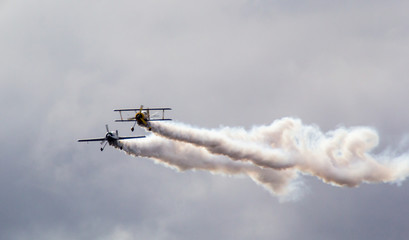 airplanes fluing with smoke on