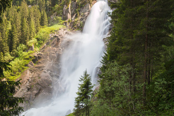 Fototapeta premium View Alpine inspiring Krimml waterfall in mountains in summer day. Trekking in National park Hohe Tauern, Austria