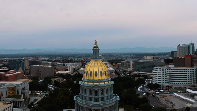 Aerial drone footage - Sunrise over the golden Colorado State Capital Building