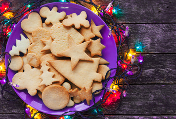 Plate with tasty holiday Gingerbread Cookies - Happy New Year card 