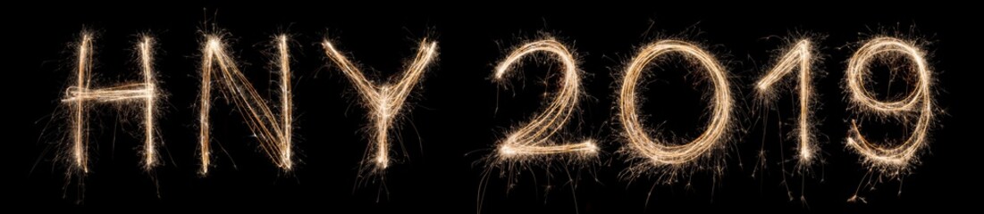 2019 Happy New Year Sparkler Light drawn in letters at night time to celebrate special holiday occasion, Christmas party, diwali, independent day or important event