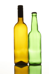 Empty wine and beer bottles. White isolated background.