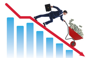 Businessman pushing money wheelbarrow down the chart