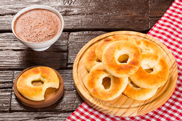 Pandequeso traditional Colombian food - Hot drink chocolate