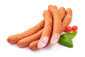 Landjager Dried Sliced German Sausages with basil leaves, isolated on a white background. Close-up
