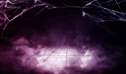 Cobweb in the basement at night, neon light, smoke, fog, concrete, smog. Halloween background