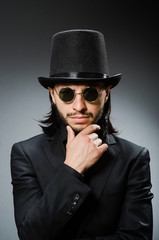 Vintage concept with man wearing black top hat