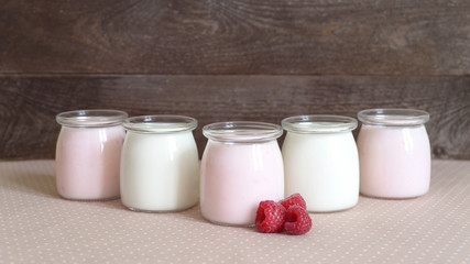 yogurt jars and fresh raspberries