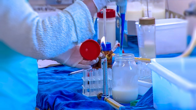 Abstract, blur, bokeh background, defocusing - image for the background. Laboratory analysis of the quality of breast milk