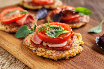 Paleo mini pizza with cauliflower crust and ham