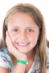 beautiful child girl posing in studio over white background