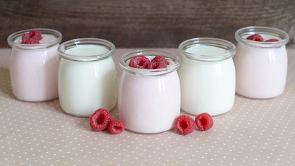 yogurt jars and fresh raspberries