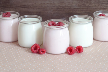 yogurt jars and fresh raspberries