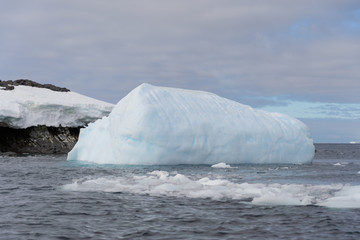 Antarctic seascape with iceberg