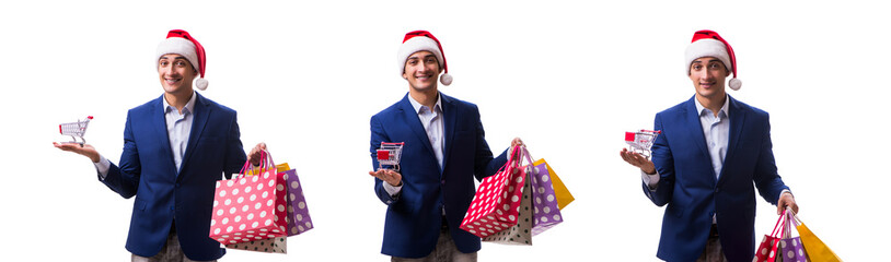 Young man with bags after christmas shopping on white background