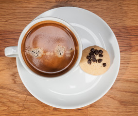 top view a cup of coffee and cookie