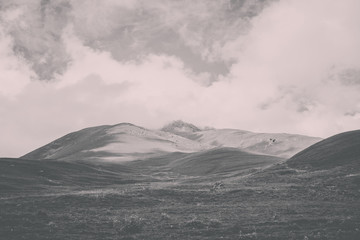Closeup view mountains scenes in national park Dombai, Caucasus, Russia, Europe. Summer landscape, sunshine weather, dramatic blue sky and sunny day