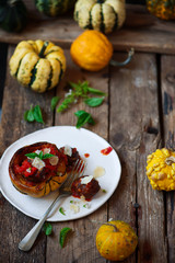 Meatball-stuffed squash with tomato sauce.selective focus