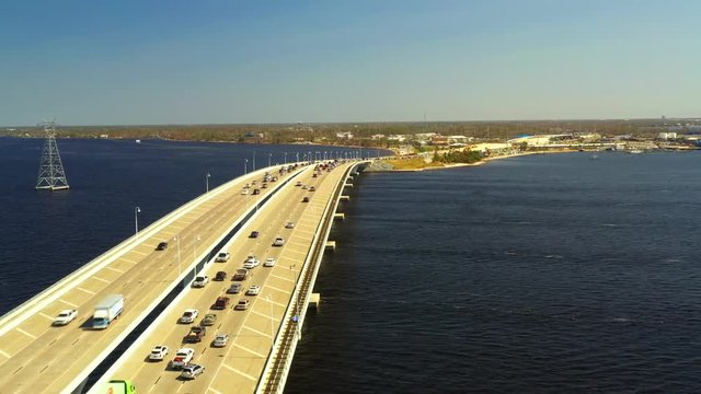 Aerial drone footage evacuation Hurricane Michael causeway bridge over water traffic