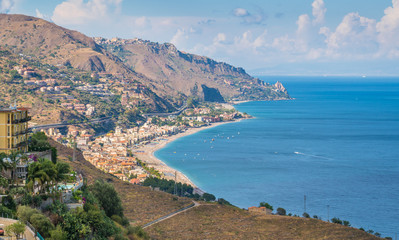 Panoramic sight of the sicilian coastline as seen from Taormina. Province of Messina, Sicily, southern Italy.