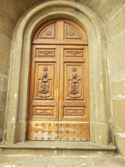 Drzwi wejściowe rzeźbione. Italia - obrazy, fototapety, plakaty