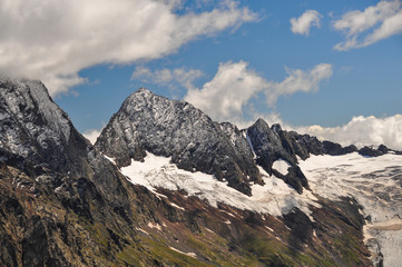 Fototapeta na wymiar Closeup mountains scenes in national park Dombai, Caucasus, Russia, Europe. Sunshine weather and blue sky, summer day