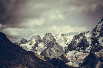 Closeup mountains scenes in national park Dombai, Caucasus, Russia, Europe. Sunshine weather and blue sky, summer day