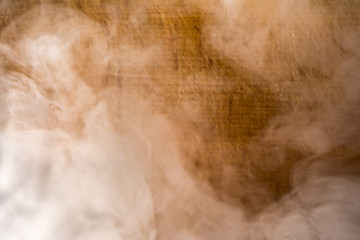 gray smoke on brown plank background, blur abstract background