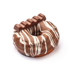 Donut glazed with milk chocolate. View from a forty-five degree angle. Isolated image.