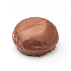 Donut glazed with milk chocolate. View from a forty-five degree angle. Isolated image.