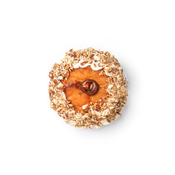 Donut with cream and hazelnut core. Top view.  Isolated image.