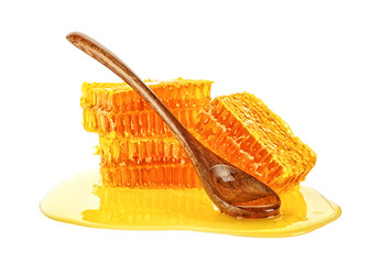 Honeycomb with honey dipper isolated on white background