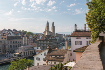 Aerial view of historic Zurich city center with famous Grossmunster Church and river Limmat from...