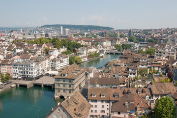 Fototapeta na wymiar Aerial view of historic Zurich city center with river Limmat from Grossmunster Church, canton of Zurich, Switzerland. Sunny day in summer