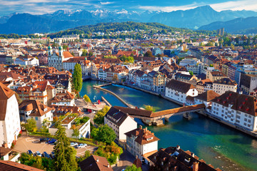 Fototapeta na wymiar City of Luzern riverfront and rooftops aerial view