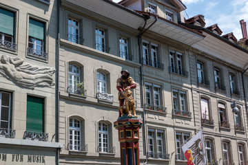 Fototapeta na wymiar Bern, Switzerland - June 25, 2017: Simsonbrunnen (Samson) fountain in Bern, Switzerland, Europe