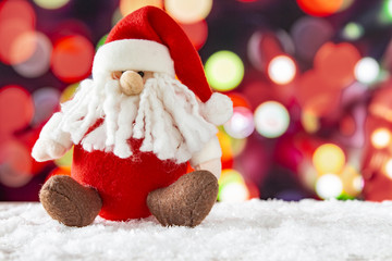 Santa Claus with a lights bokeh background. Christmas concept