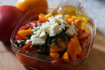 Cut ingredients for summer cheese salad