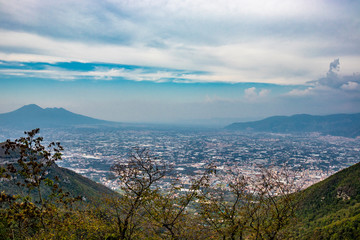 View of the valley from the Regional Park of Monti Lattari, Pompeii and Mount Vesuvius in the background. In the province of Salerno, on the Amalfi coast.