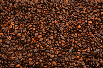 Coffee beans background. Top view. Coffee beans texture.