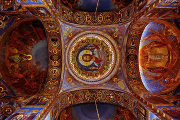 Fototapeta na wymiar Painting, decoration, frescos on the walls, the ceiling, the dome, the arches in Church of St. Nicholas in Kronstadt. St. Petersburg, Russia, Europe