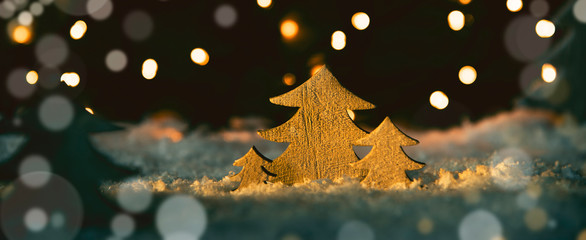 Wooden Christmas Trees, Snow, Magic Lights And Bokeh Background