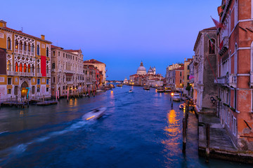 Grand Canal with Basilica di Santa Maria della Salute in Venice, Italy. Night view of Venice Grand Canal. Architecture and landmarks of Venice. Venice postcard