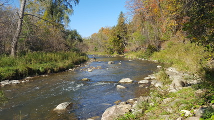 Fototapeta na wymiar Autumn River in North America/Canada