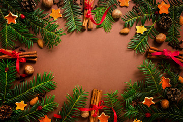 Fototapeta na wymiar Christmas border design on the brown background