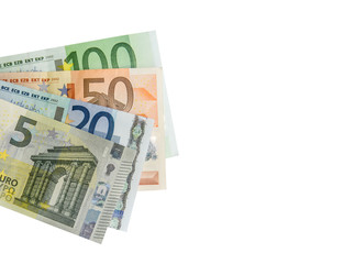 Stack of Euro banknotes isolated on white.