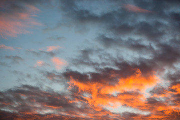 Beautiful and dramatic red clouds sky at sunset