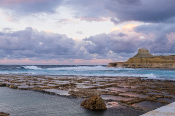 Marsalforn xwejni bay Saltpans. Cave view