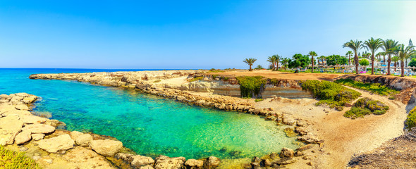 A view of a azzure water and Nissi beach in Aiya Napa, Cyprus - obrazy, fototapety, plakaty